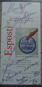 Manifesto di "Esposti - Nascere al tempo della ruota"- mostra di documenti dell’Archivio storico provinciale di Como dedicata ai bambini abbandonati